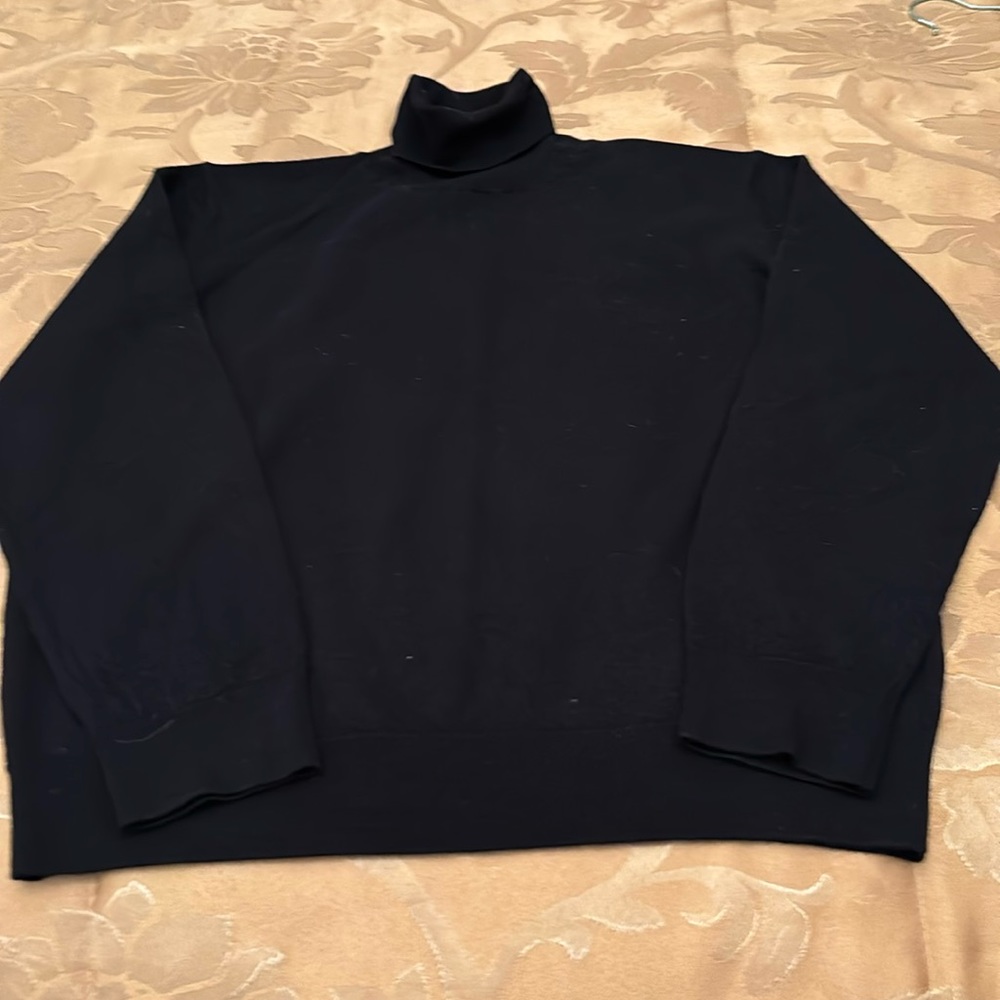 Navy turtleneck sweater.  100% Marino wool.  Made in Italy.